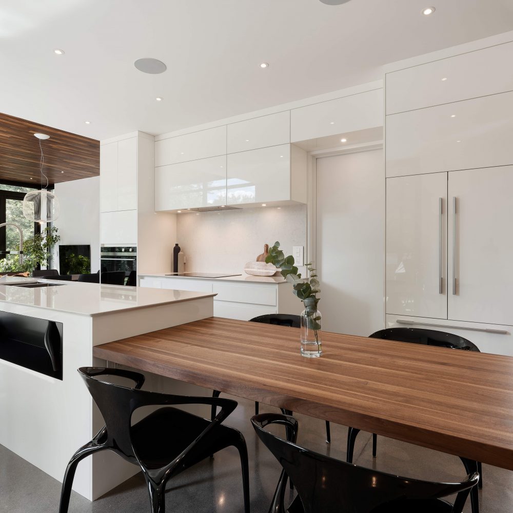 Cabico Custom Cabinets - White Oasis kitchen project - view with the kitchen island and the lunch corner