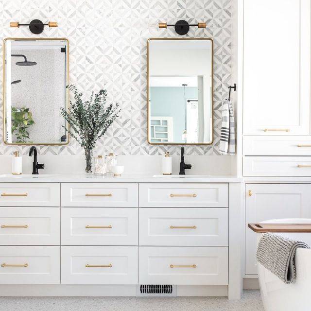 There's only one word to describe this bathroom...dreamy! ✨

Design: @dinnissendesignco 
Photos: @amandamarycreative 
.
Cabinetry:
Unique Series
Low Chantilly on MDF, custom door style Z-2805 
.
.
.
#HelloCabico #Cabico #CabicoCabinetry #CabicoCabinets #CustomCabinets #CustomCabinetry #CustomDesign #CabinetGoals #BathroomDesign #Bathroom #BathDesign #DesignInspiration #InteriorDesign #WhiteBathroom #BathroomStorage