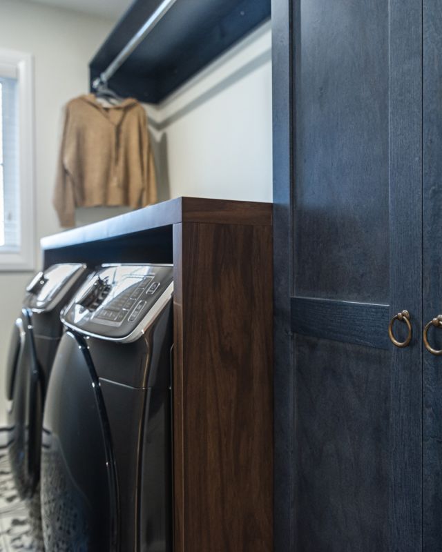 Blue Abyss stain gives depth and character to this laundry room. A unique yet timeless hue that surrounds the space with calm and style. 

Unique Series Cabinetry: Blue Abyss on Cherry, 600/K door style
Designer: Patricia Lehouillier

#hellocabico #cabicocabinets #luxurydesign #customcabinets #laundryroom #organization #storage #bluecabinetry
