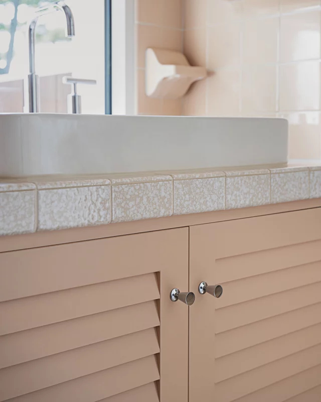 Vintage pink tiling brings a timeless charm to this bathroom and is seamlessly completed by a Cabico made-to-measure vanity. This pink tone can be matched perfectly to any home’s esthetic, adding a personalized touch to the space.

Explore how to personalize with pink in your own home.
https://bitly.cx/ObCj1

Dealer: Cabico
Designer: Cindy Raymond
Materials: Custom doors and colors 
Photographer: Marc-Antoine Hallé (Studio Arago)
.
.
.
.
#cabico #cabicocabinetry #customcabinetry #customcabinets #interiordesign #pinkdecor #pinkbathroom #vintagebathroom #bathroomideas #midcentury #midcenturybathroom