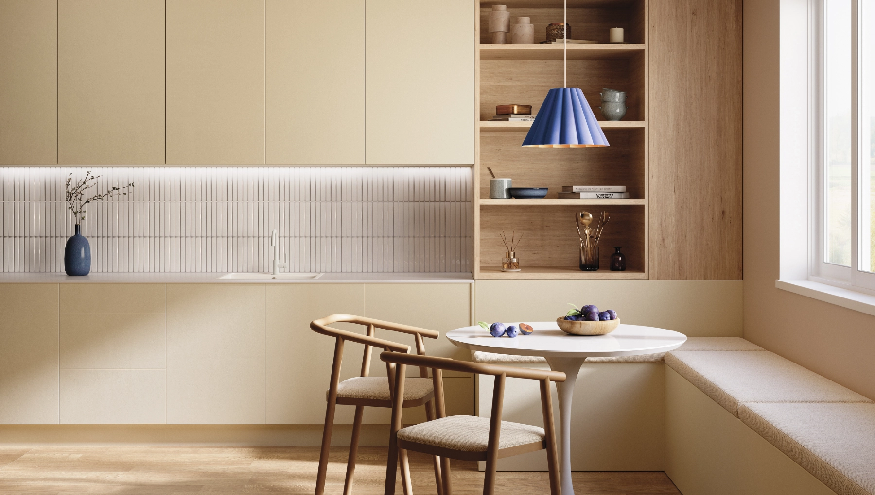 Essence by Cabico kitchen in Modena door style with Crema-painted MDF. Scandinavian-inspired design with integrated bench seating, light wood tones, and eclectic colorful accents.